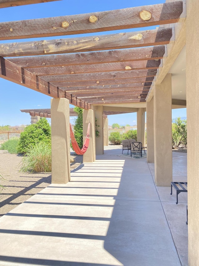 761 Marble Sky Ave NE, Rio Rancho, NM 87144 - view of patio / terrace with a pergola