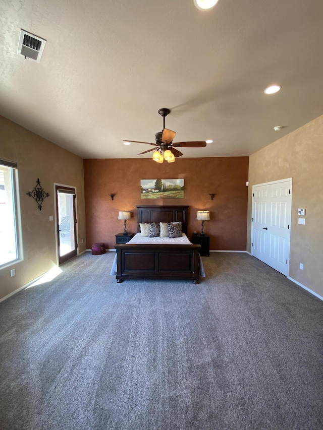 unfurnished bedroom featuring recessed lighting, carpet flooring, baseboards, and visible vents