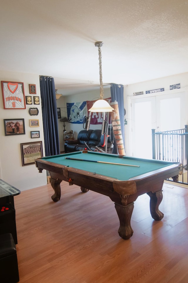 rec room with pool table and wood finished floors