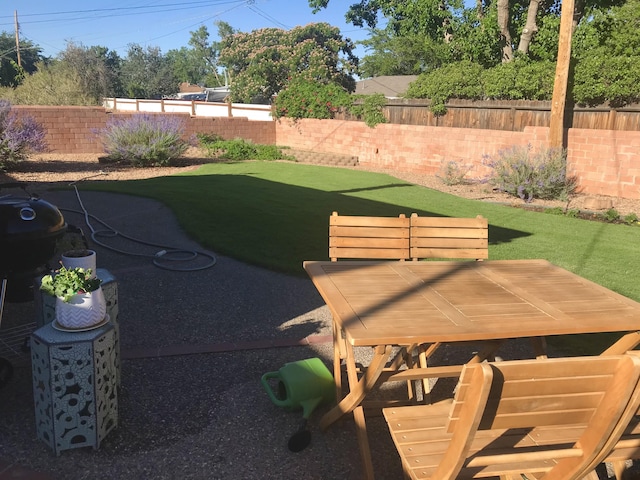 view of yard featuring a fenced backyard