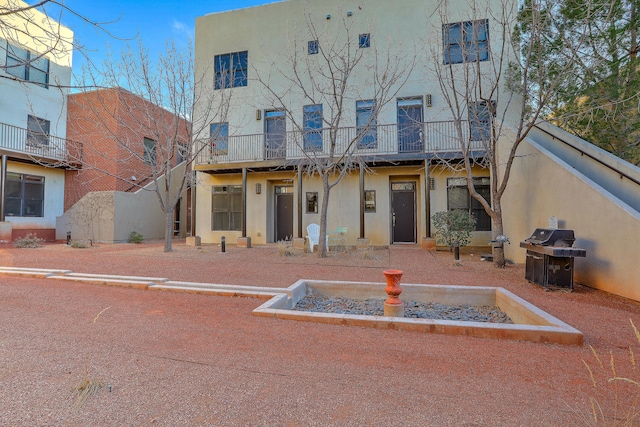 view of front of property featuring stucco siding