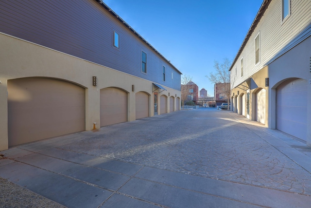 view of road with community garages