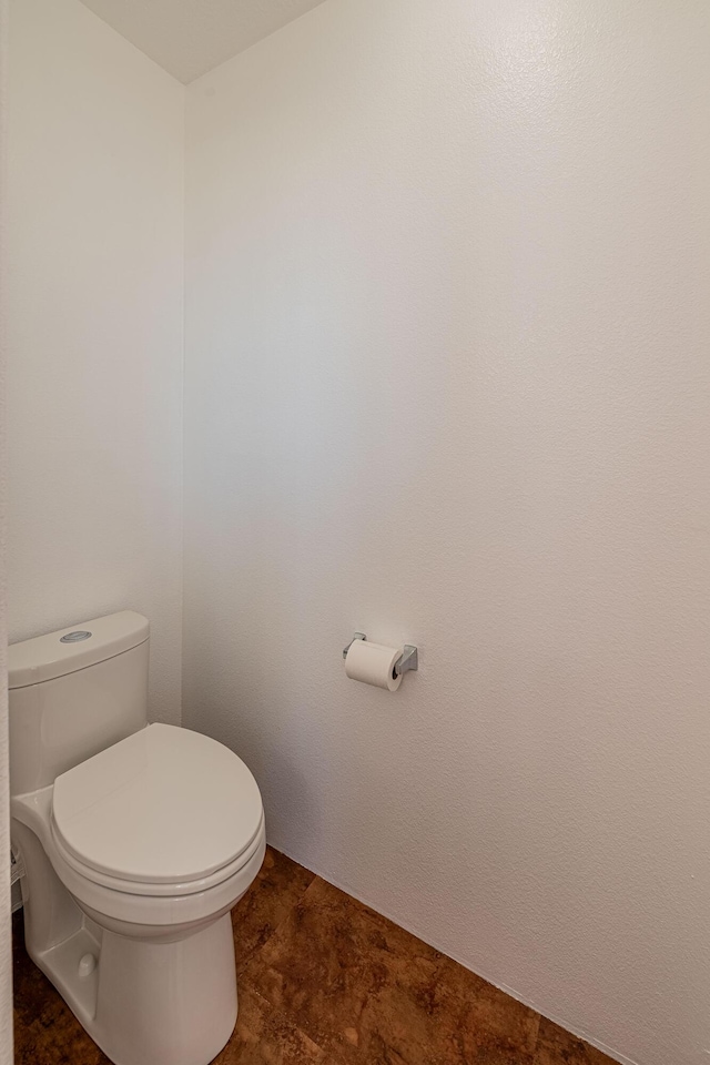 bathroom featuring toilet