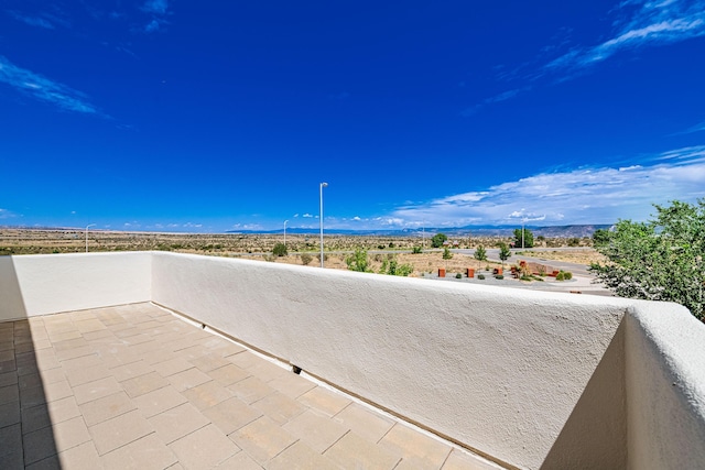 view of patio / terrace with a balcony