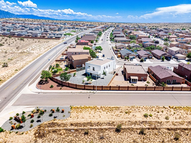 birds eye view of property featuring a residential view and a mountain view