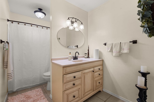 bathroom with baseboards, toilet, a shower with shower curtain, tile patterned floors, and vanity