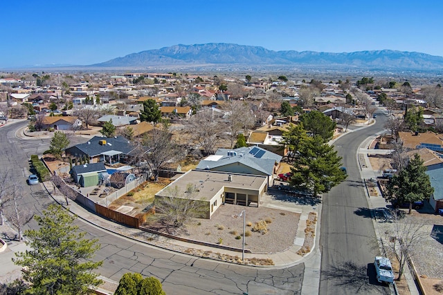 aerial view with a mountain view and a residential view