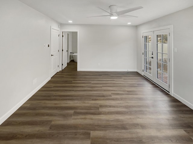 spare room with baseboards, dark wood finished floors, recessed lighting, french doors, and a ceiling fan