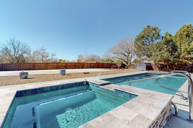 view of pool with a fenced backyard and a fenced in pool