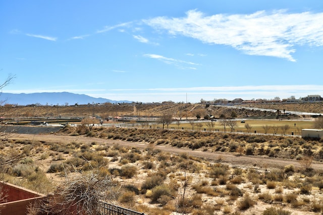 view of mountain feature with a rural view