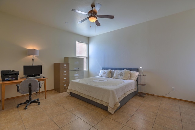 bedroom featuring light tile patterned floors, baseboards, and ceiling fan