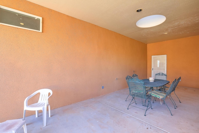 view of patio featuring outdoor dining space