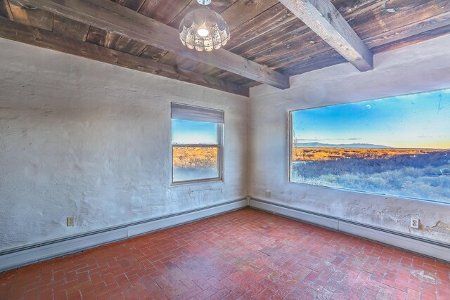 3805 Riverview Rd NW, Albuquerque, NM 87105 - unfurnished room with a wooden ceiling with exposed beams and brick flooring