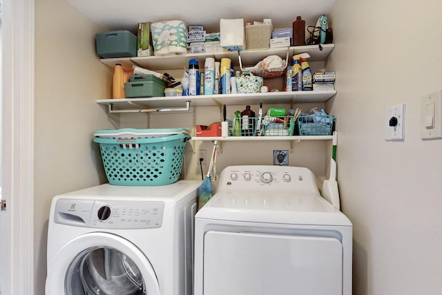 laundry area with laundry area and independent washer and dryer