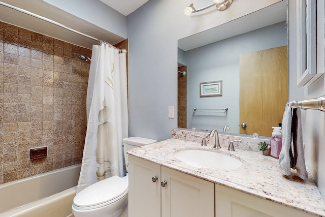 bathroom with vanity, toilet, and shower / bath combo with shower curtain