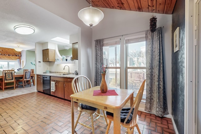 dining area featuring wood ceiling, brick floor, and vaulted ceiling