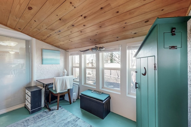 sunroom featuring wood ceiling and vaulted ceiling