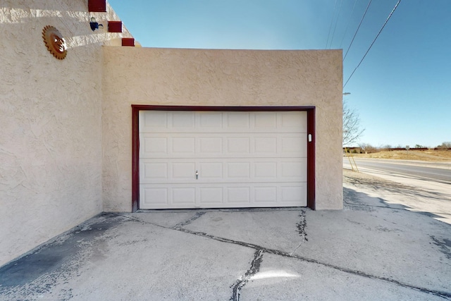 garage with driveway