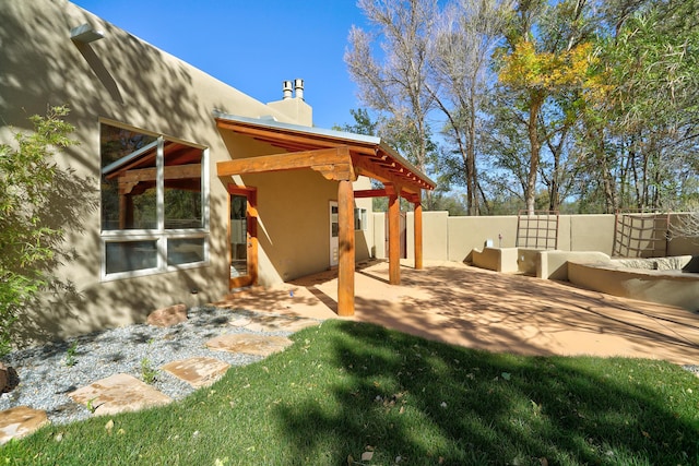 view of yard featuring a patio and fence