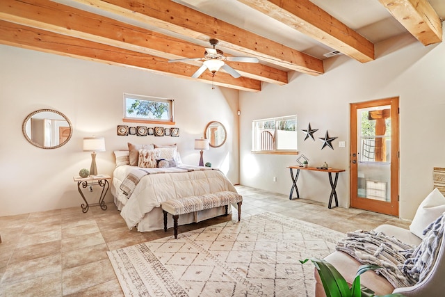 bedroom with visible vents, multiple windows, and beam ceiling