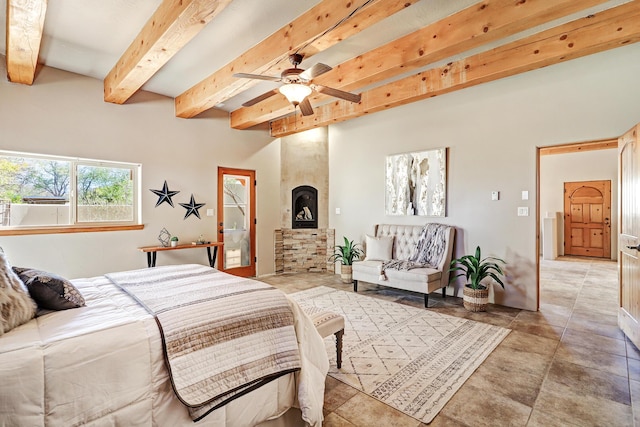 bedroom with beamed ceiling and a ceiling fan