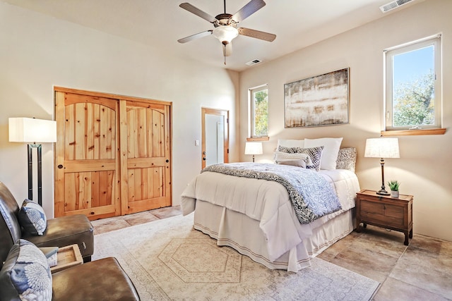 bedroom featuring visible vents and a ceiling fan