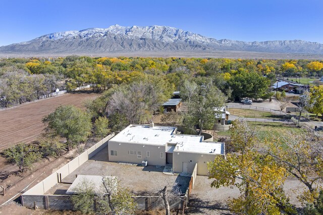 drone / aerial view featuring a mountain view