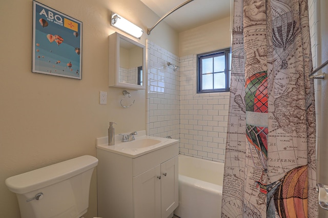 full bathroom featuring vanity, toilet, and shower / bath combo with shower curtain