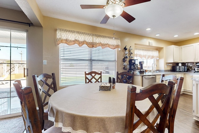 dining room with recessed lighting, dark wood-type flooring, and ceiling fan