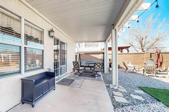 view of patio / terrace with fence