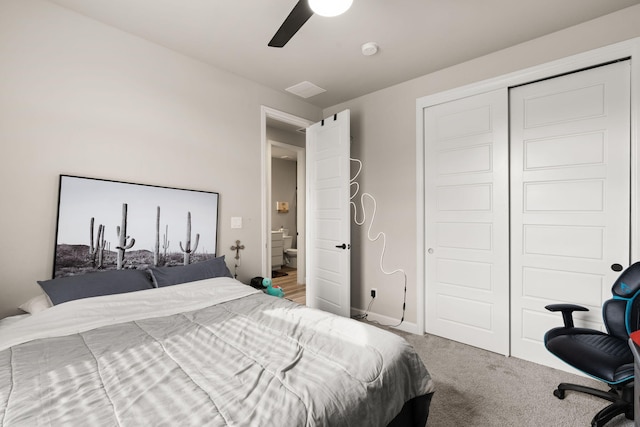 carpeted bedroom with baseboards, ceiling fan, and a closet