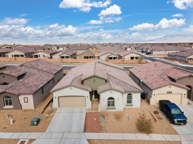 birds eye view of property with a residential view