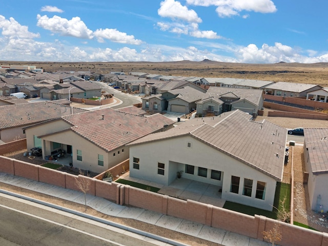 aerial view with a mountain view and a residential view