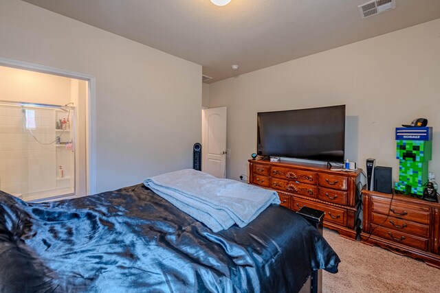 bedroom featuring visible vents and carpet