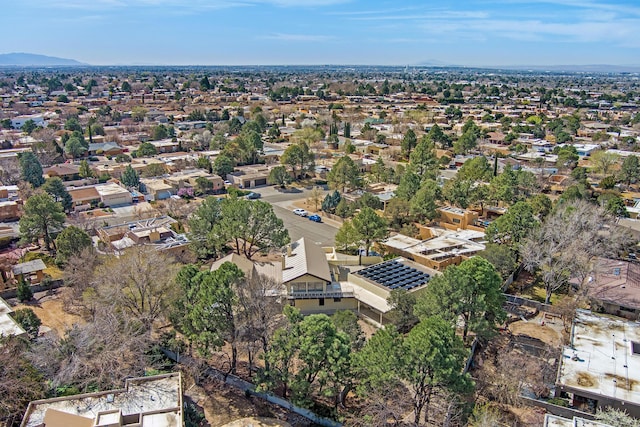 birds eye view of property with a residential view