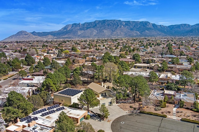 aerial view with a mountain view and a residential view