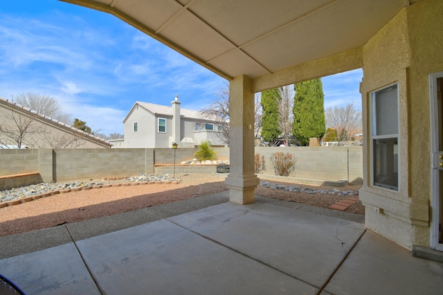 view of patio featuring a fenced backyard