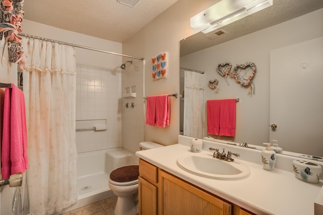 full bath with toilet, curtained shower, a textured ceiling, tile patterned flooring, and vanity