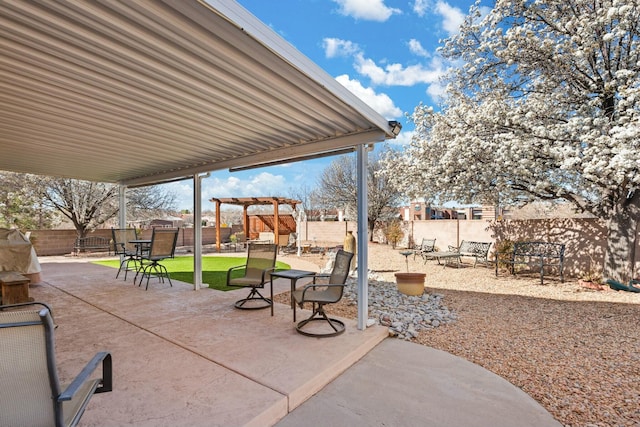 view of patio featuring a fenced backyard and a pergola