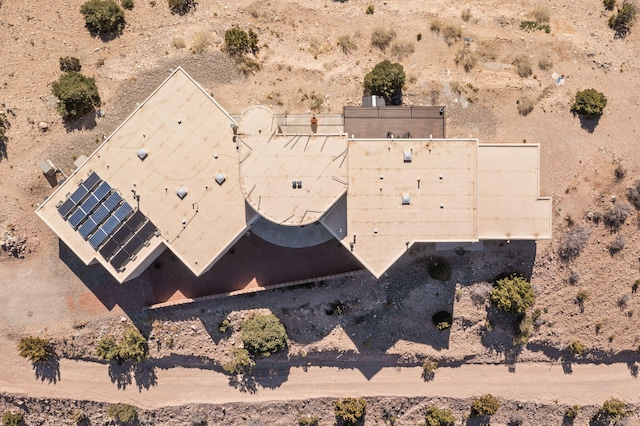 birds eye view of property with view of desert