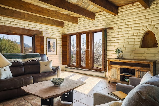 living area with tile patterned floors, beamed ceiling, wood ceiling, and baseboard heating