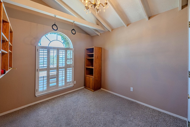 carpeted spare room with lofted ceiling with beams, baseboards, and an inviting chandelier