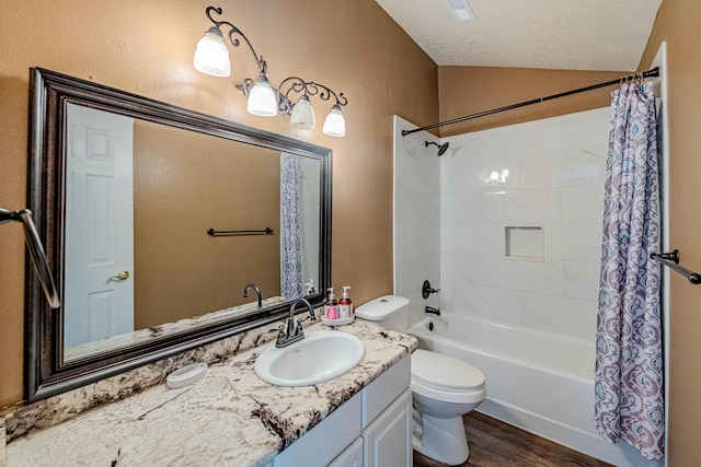 bathroom featuring wood finished floors, vaulted ceiling, shower / tub combo, a textured ceiling, and toilet