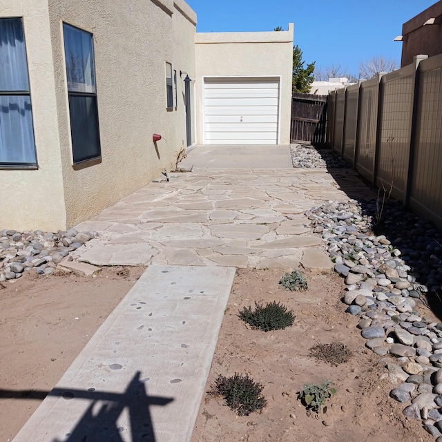 view of yard with a patio and a fenced backyard