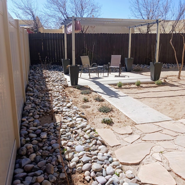 view of patio with a fenced backyard