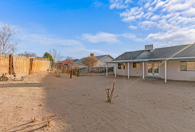 view of yard with a patio and a fenced backyard