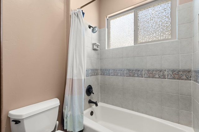 full bathroom with toilet and shower / bathtub combination with curtain