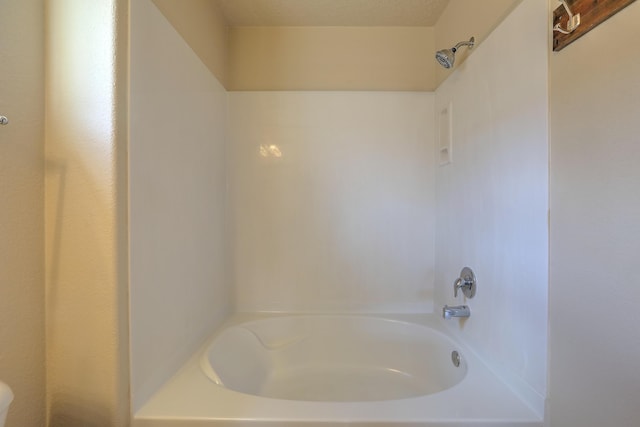 full bathroom with toilet and shower / tub combination