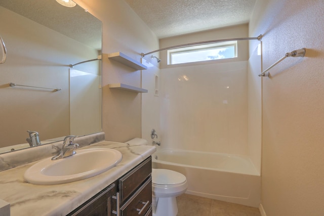 bathroom featuring vanity, tile patterned flooring, a textured ceiling, toilet, and shower / bathtub combination