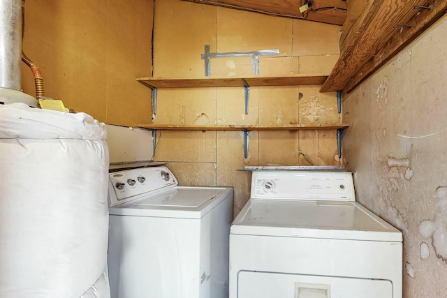 laundry area with laundry area and separate washer and dryer